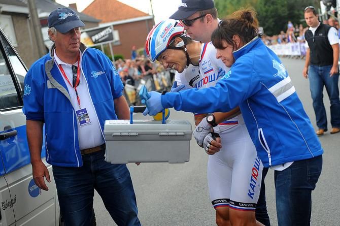 Alexander Porsev receiving assistance after crashing