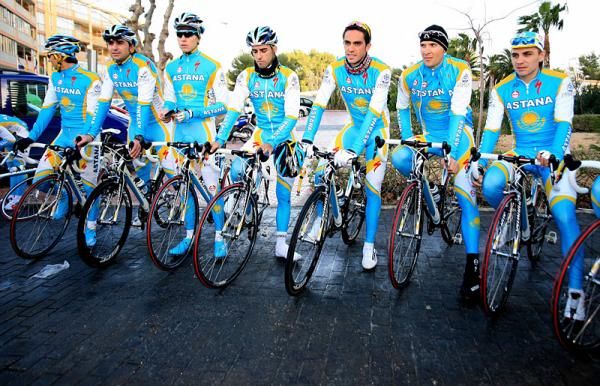 Astana team members await the start of a training ride in Calpe, Spain.