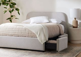 gray bed with storage drawers