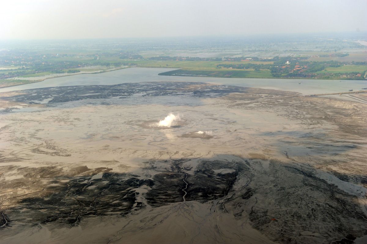 An aerial view taken on May 26, 2010, of the &quot;Lusi&quot; mud volcano and the mud it has spewed across surrounding villages in Porong, Sidoarjo district, on East Java. 