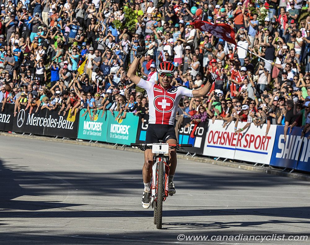 Nino Schurter winning his 7th elite men's world title on home soil