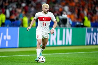 Baris Alper Yilmaz #21 of Turkiye controls the ball during the UEFA EURO 2024 quarter-final match between Netherlands and Türkiye at Olympiastadion on July 6, 2024 in Berlin, Germany.
