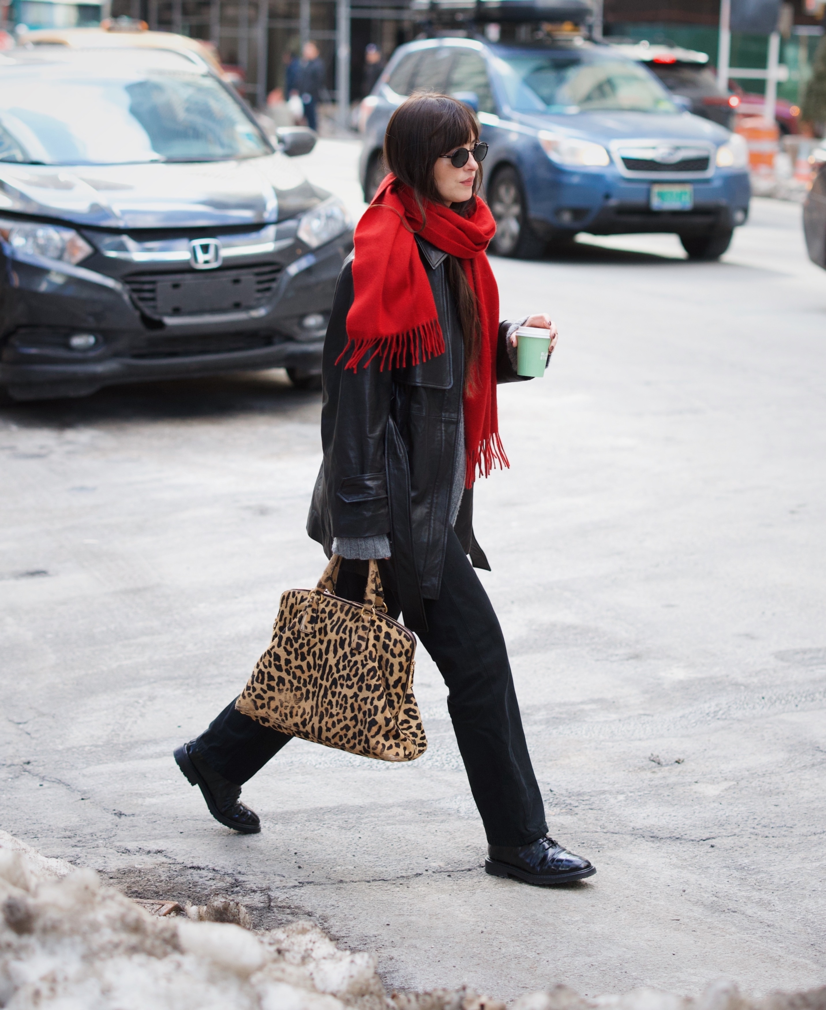 Dakota Johnson wore a vintage Prada tote as a laptop bag