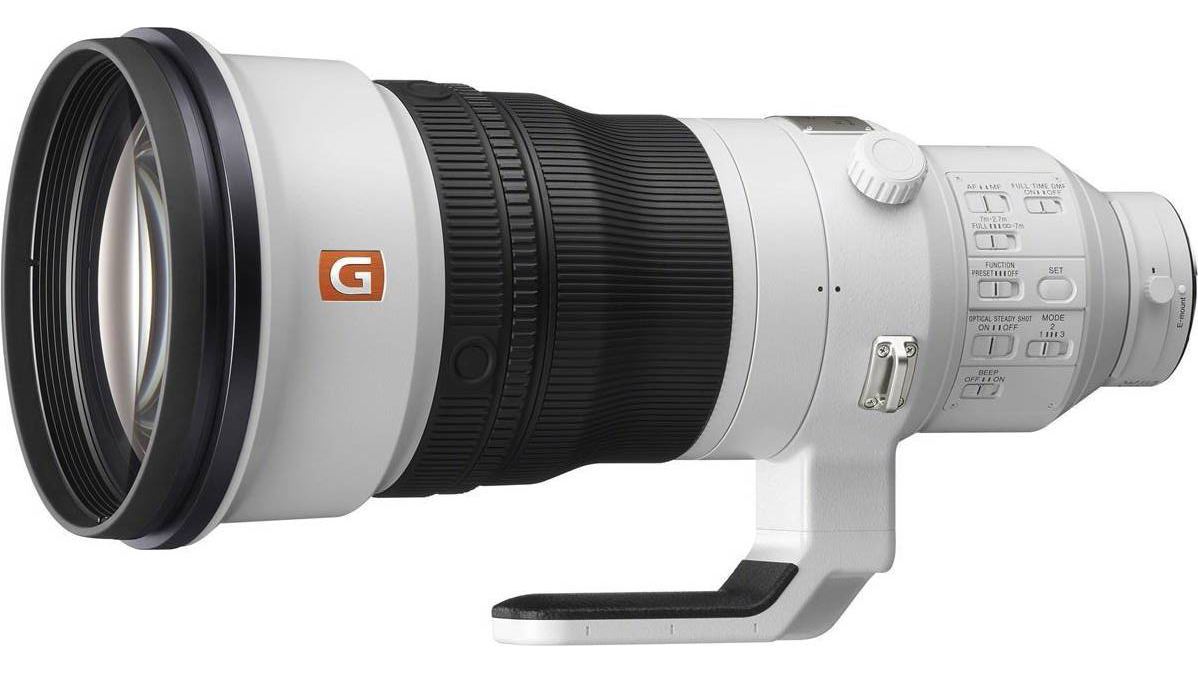Close-up of a Sony G-series lens, featuring a large white barrel, black grip, control buttons, and a sturdy tripod mount