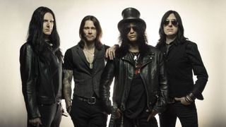 Brent, pictured right, with Slash and the rest of the band
