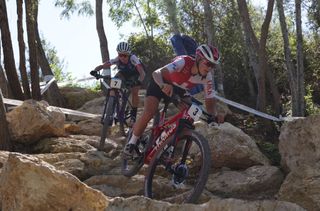 Switzerlands Alessandra Keller R and Frances Loana Lecomte L compete in the womens Elite Cross Country mountain biking test event at Elancourt Hill in Elancourt west of Paris on September 24 2023 Photo by Thomas SAMSON AFP Photo by THOMAS SAMSONAFP via Getty Images