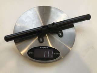 Image shows the Specialized Air Tool Road mini pump on a weighing scale