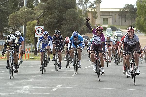 Jonathan Cantwell (2nd from right) celebrates as his happy Fly V Australia teammate Michael Hepburn takes out the eleventh stage.