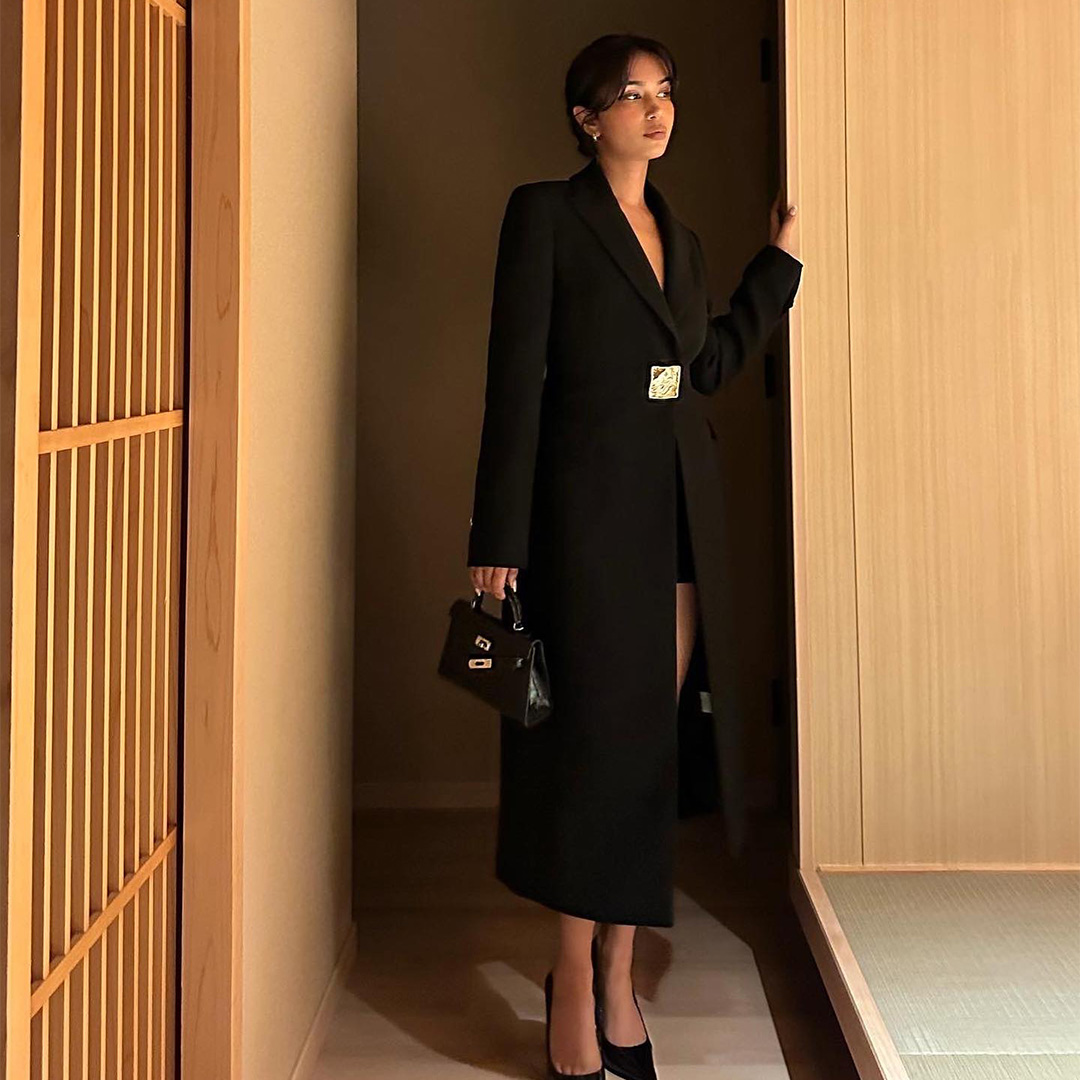 Mishti Rahman wears Carla Zampatti with an elegant updo while visiting Shinjuku City