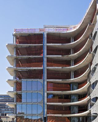 exterior of building with façade work, cladding the building in steel and glass