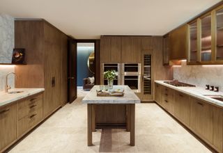 kitchen in wood and stone at No.1 Grosvenor Square