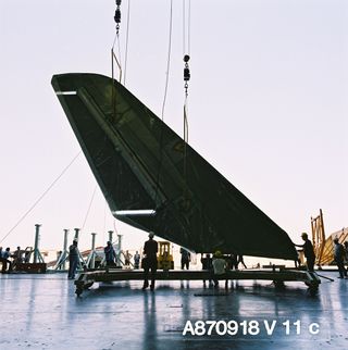 The vertical tail is being delivered from Fairchild (New York) to the Rockwell Palmdale facility on September 18, 1987.