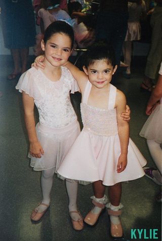 Kendall and Kylie Jenner wearing ballet outfits as young girls.