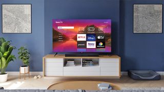 Roku TV on stand in living room