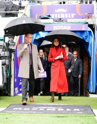 Kate's bold color choice brightened up a rainy, English day