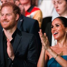 Prince Harry, Duke of Sussex and Meghan, Duchess of Sussex are seen during the closing ceremony of the Invictus Games.