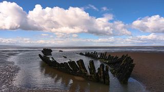 How to do seascape photography: image shows a wrecked boat on the north Somerset coast, UK