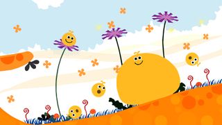 best PSP games: a large yellow blob and three small yellow blobs in a orange landscape with grass and flowers