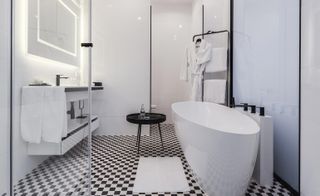 Bathroom with free standing bathtub & monochrome checked floors