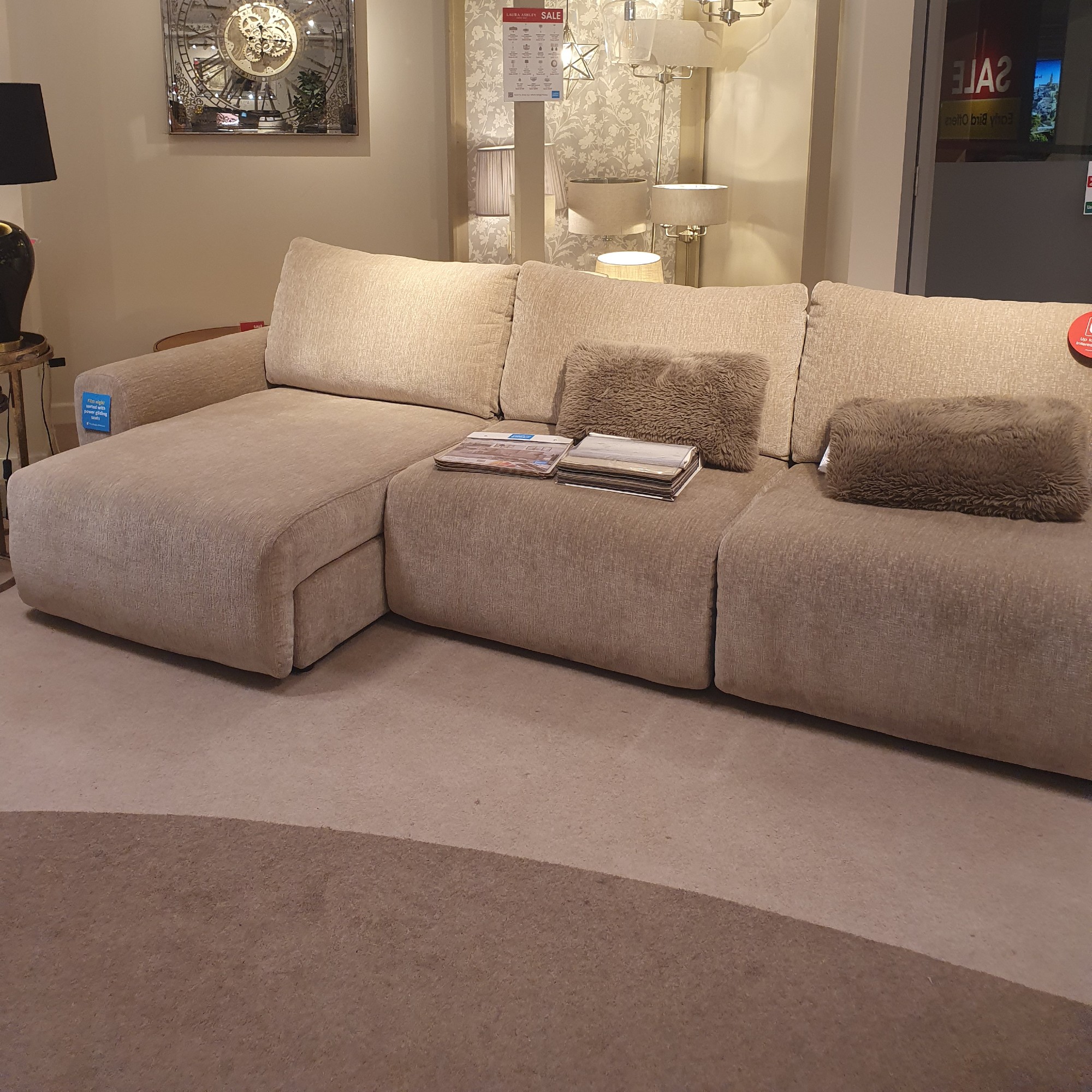 The Ideal Home Gemini sofa in beige at a Furniture Village store
