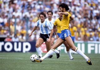 Socrates on the ball for Brazil against Argentina at the 1982 World Cup.