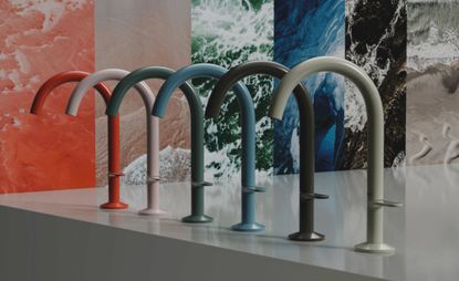 Colourful taps lined up in showroom