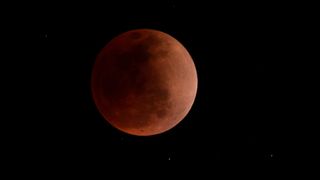 A photograph of a total lunar eclipse in Canta, east of Lima on May 15, 2022.