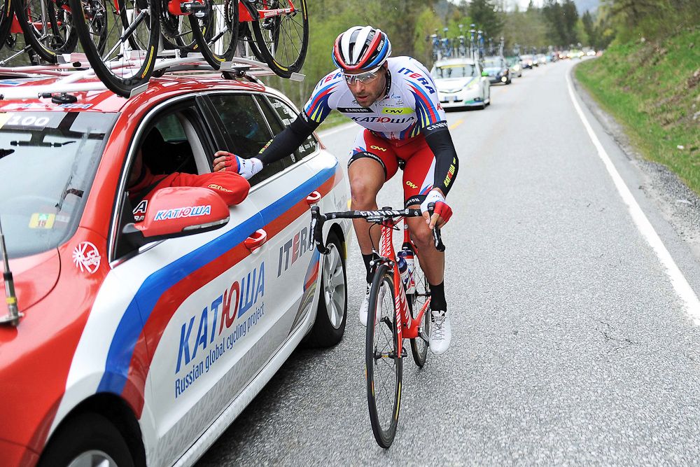 Marco Haller chats with the Katusha team car.