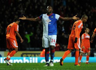 Yakubu of Blackburn Rovers celebrates scoring his fourth goal during the Barclays Premier League match between Blackburn Rovers and Swansea City at Ewood Park on December 3, 2011 in Blackburn, England.