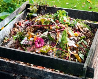 Compost pile in garden