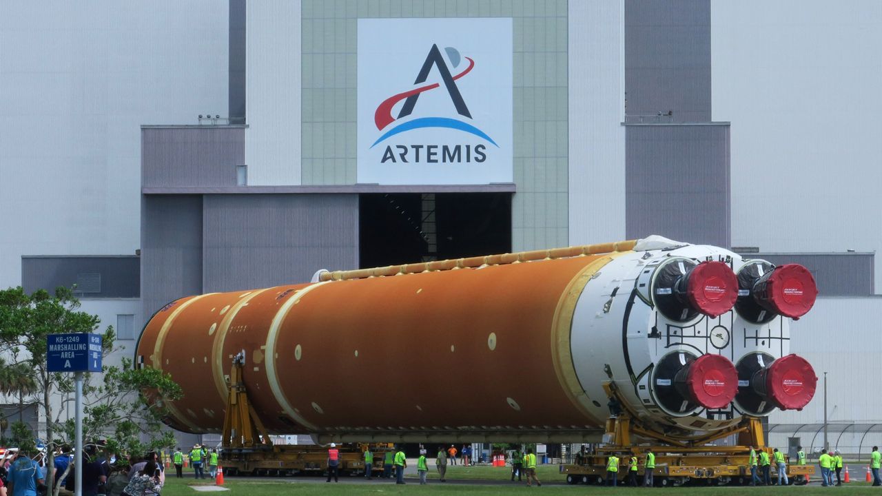 The SLS stage core for the Artemis II rocket is loaded into NASA&#039;s Vehicle Assembly Building on July 14, 2024.