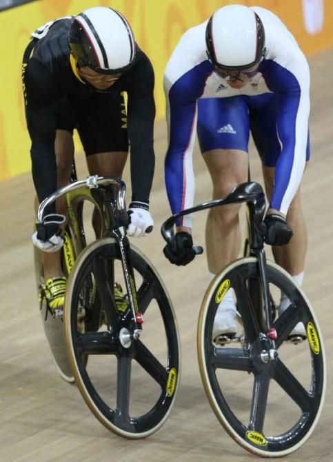 Chris Hoy and Malaysia's Mohd Azizulhasni Awang compete in the 2008 Beijing Olympic Games