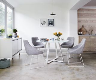 grey fabric dining set in contempoitrary open plan kitchen by furniture village
