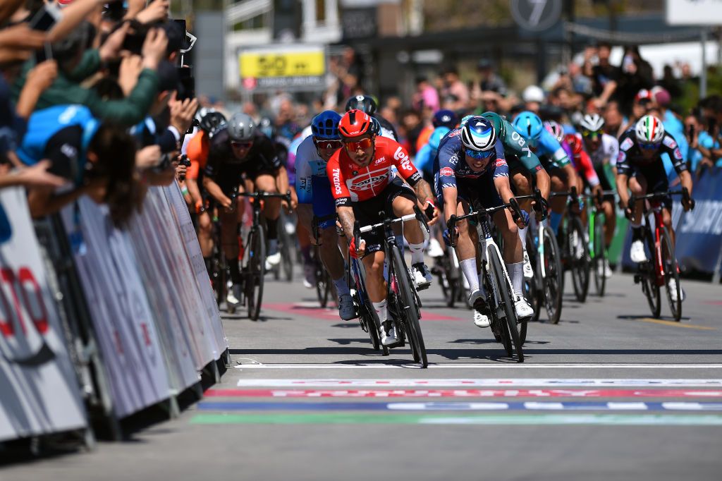 KUSADASI TURKEY APRIL 10 LR Caleb Ewan of Australia and Team Lotto Soudal and Jasper Philipsen of Belgium and Team AlpecinFenix sprint at finish line during the 57th Presidential Cycling Tour Of Turkey 2021 Stage 1 a 202km stage from Bodrum to Kuadas TUR2022 on April 10 2022 in Kusadasi Turkey Photo by Dario BelingheriGetty Images