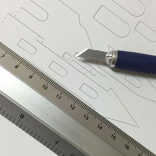 Once you've created your design, cut using your knife or use a cutting machine