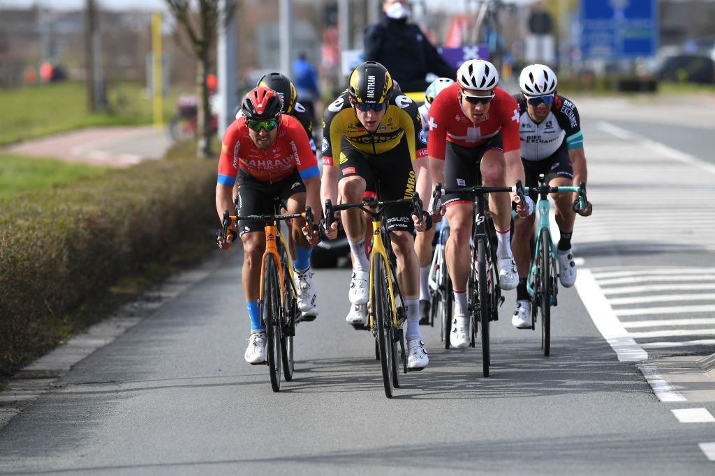 WEVELGEM BELGIUM MARCH 28 Sonny Colbrelli of Italy and Team Bahrain Victorious Wout Van Aert of Belgium Nathan Van Hooydonck of Belgium and Team Jumbo Visma Giacomo Nizzolo of Italy and Team Qhubeka Assos Matteo Trentin of Italy and UAE Team Emirates Michael Matthews of Australia and Team Team BikeExchange Stefan Kung of Switzerland and Team Groupama FDJ during the 83rd GentWevelgem in Flanders Fields 2021 Mens Elite a 254km race from Ypres to Wevelgem GWE21 GWEmen FlandersClassic on March 28 2021 in Wevelgem Belgium Photo by Tim de WaeleGetty Images