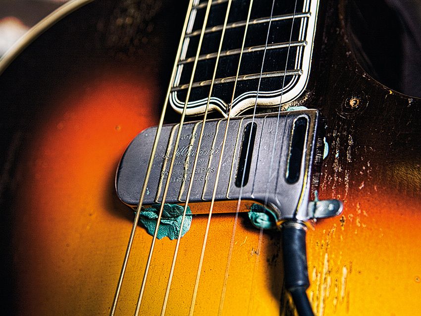 Smith's DeArmond pickup is held on with, yep, Blu-Tack.