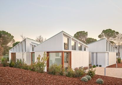 hero exterior of spanish house with angular roofs