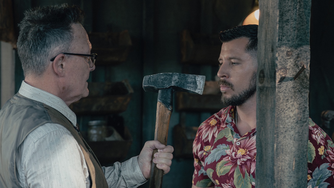 Jeremiah holding axe up to Cole's face in Tulsa King Season 3 finale