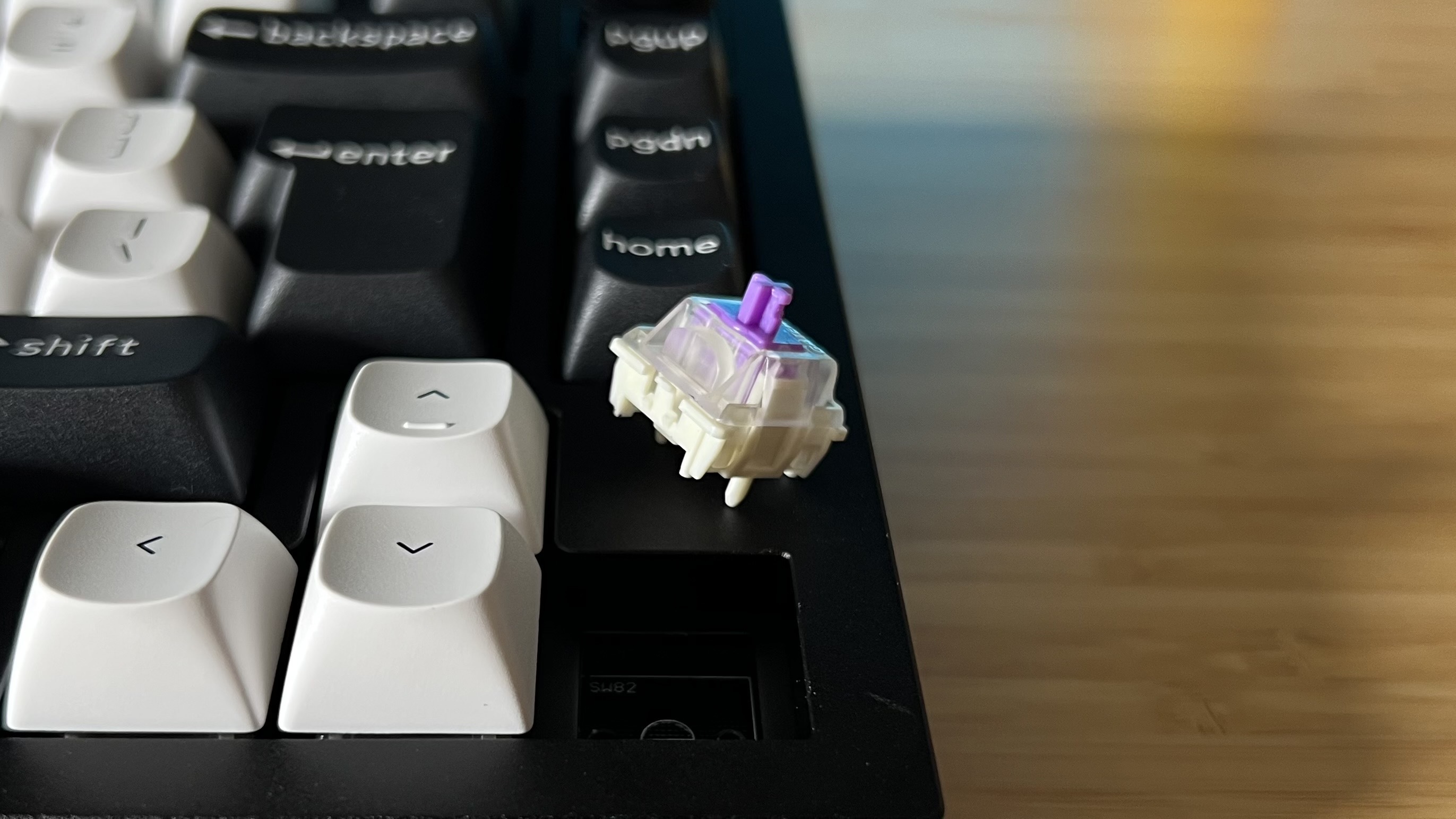 Gateron Nebula Hall effect switch on the corner of a Keychron Q1 HE keyboard