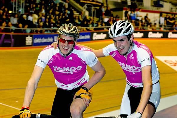 Ed Clancy and Andy Tennant celebrate after the fastest 1km Madison time trial.