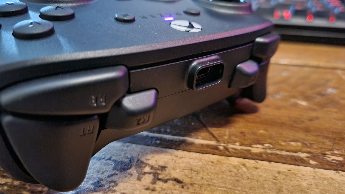 The topside controls of the Razer Wolverine V4 Pro, either side of the protruding USB Type-C port