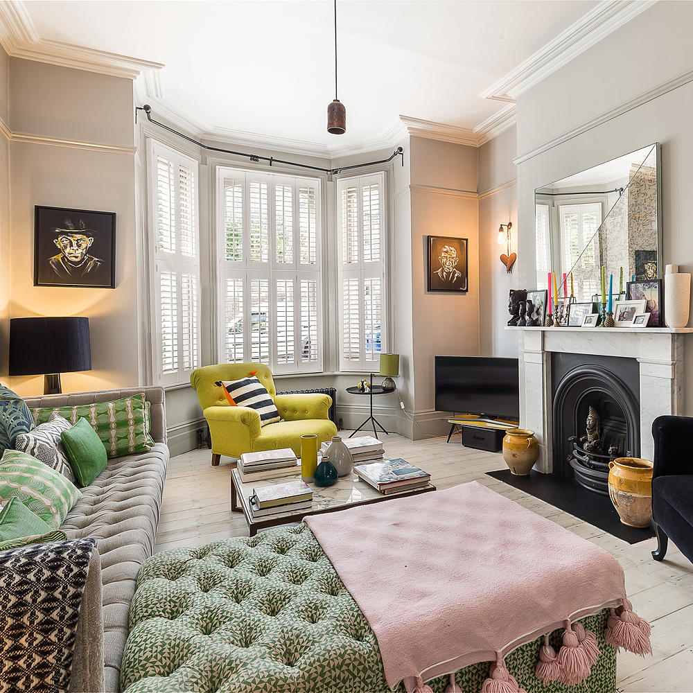 living room with sofa and armchair