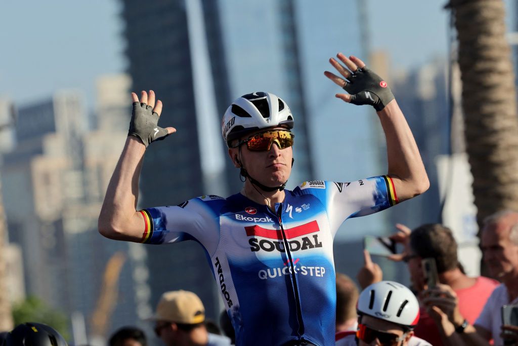 Soudal-Quick Step Team's Belgian cyclist Tim Merlier gestures as he wins the fourth stage of the 6th UAE Cycling Tour, in Dubai, on February 22, 2024. (Photo by Giuseppe CACACE / AFP)