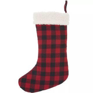 red and black plaid Christmas stocking with white fur