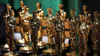 Table of statues at the Oscars in 2022.