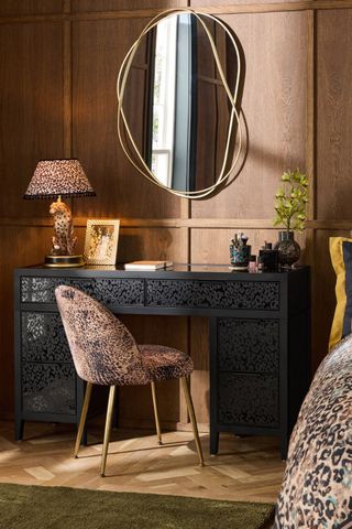 picture of leopard print vanity desk in bedroom