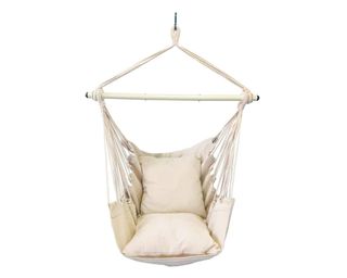 A cream fabric hammock chair with seat and back cushions