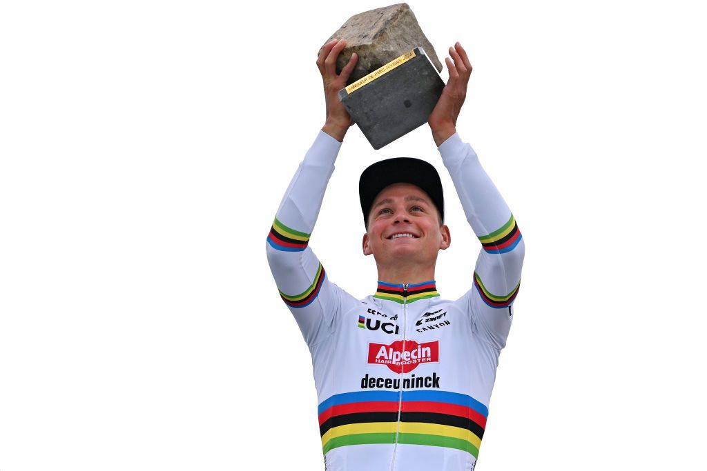 ROUBAIX FRANCE APRIL 07 Mathieu van der Poel of The Netherlands and Team Alpecin Deceuninck celebrates at podium as race winner with the Cobblestone Trophy during the 121st ParisRoubaix 2024 a 2597km one day race from Compiegne to Roubaix UCIWT Roubaix Velodrome Velodrome Andre Petrieux on April 07 2024 in Roubaix France Photo by Luc ClaessenGetty Images