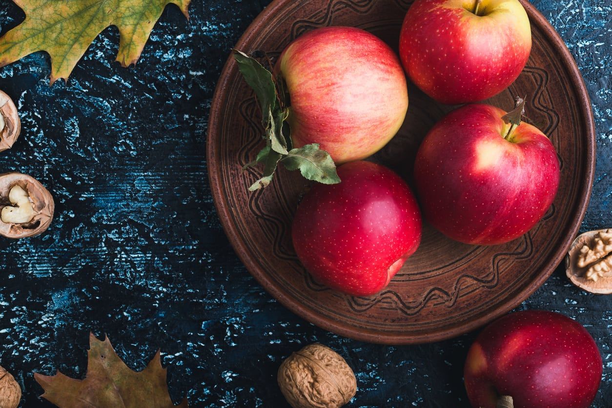 Decorative Table With Plate Of Red Apples